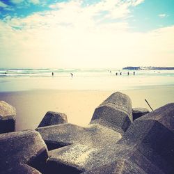 Scenic view of beach against sky