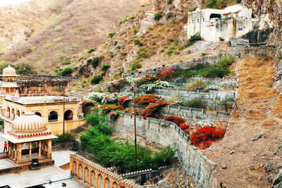 High angle view of hanuman temple by mountain at galtaji