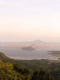 Scenic view of landscape against sky during sunset