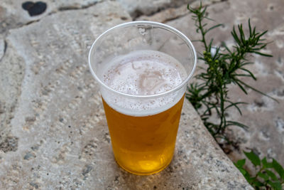 High angle view of beer glass on table