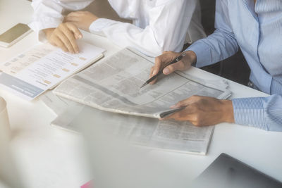 High angle view of man working on table