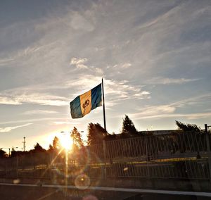 Low angle view of road against sky during sunset