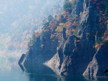 Scenic view of mountain by sea