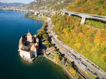 High angle view of river amidst buildings in city