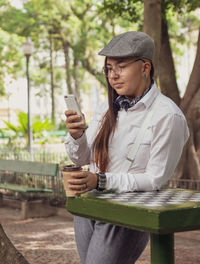 Young man using mobile phone