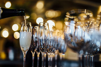 Pouring and serving champagne in a luxury social events like weddings and party.