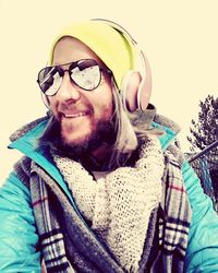 Portrait of happy man wearing hat