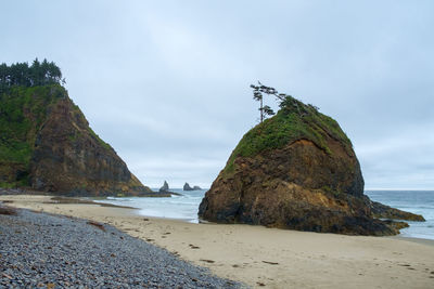 Short beach and sea stack, tillamook, oregon, pacific northwest, usa on an overcast rainy day