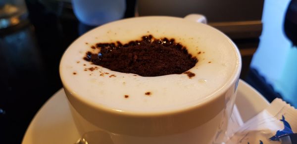 Close-up of coffee cup on table