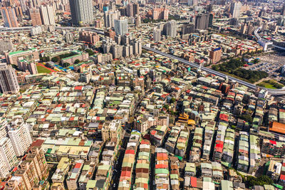 High angle view of street amidst buildings in city