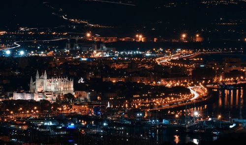 High angle view of illuminated buildings at night