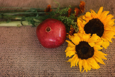 Close-up of sunflower on table