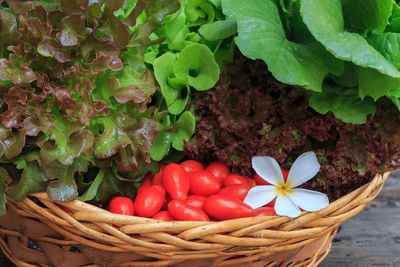 Close-up of vegetables in wicker basket on table