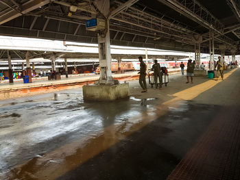 People at railroad station