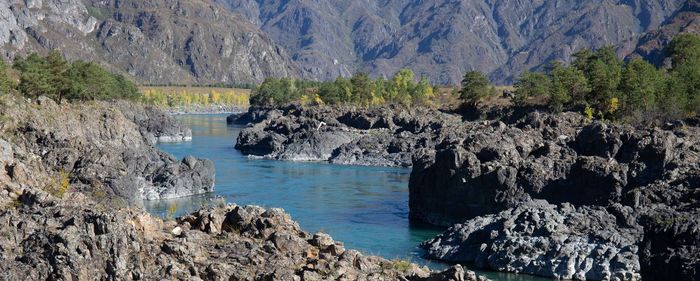 Scenic view of sea and mountains