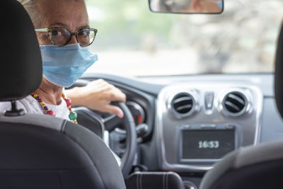 Portrait of man in car