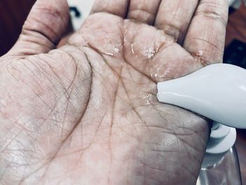 Close-up of person holding hands