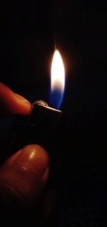 Close-up of burning candle