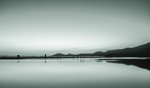 Scenic view of lake against clear sky