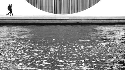 Reflection of people in water