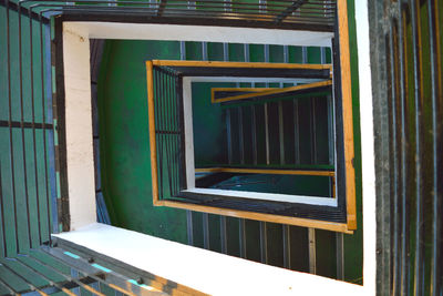 Directly above view of spiral staircase in building