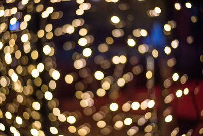 Defocused image of illuminated light bulb