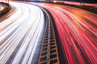 High angle view of light trails on road