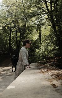 Rear view of woman walking on street