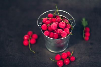 High angle view of strawberries in bowl on table