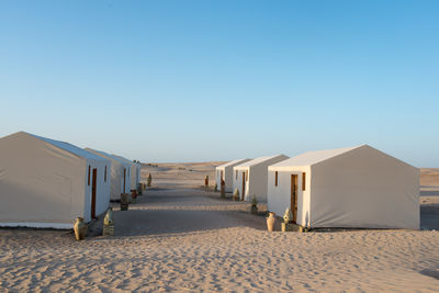 Scenic view of building against clear blue sky
