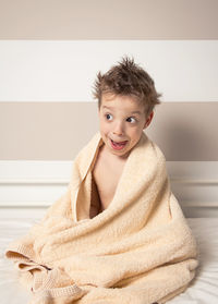 Portrait of smiling boy at home