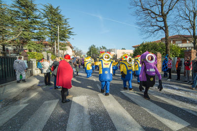 High angle view of people standing on road