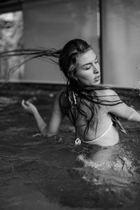 High angle view of young woman in swimming