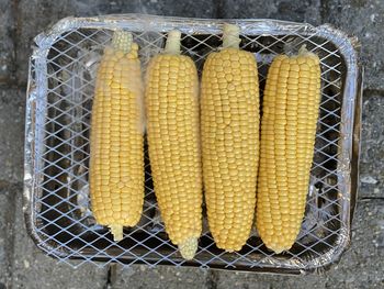 High angle view of corn on barbecue grill