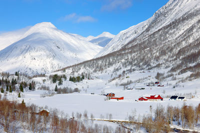 Scenic view of snowcapped mountains against sky