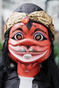 Close-up of man wearing mask outdoors