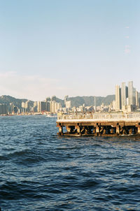 View of bridge over sea against clear sky