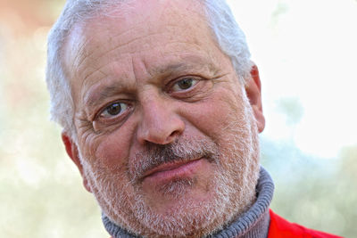 Close-up portrait of mid adult man