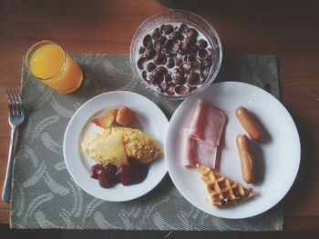 Close-up of breakfast served on table