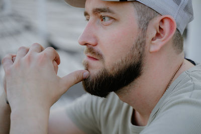 Side view of man smoking cigarette