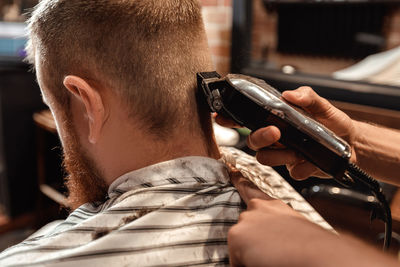 Barber grooming customer