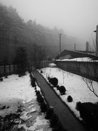 Scenic view of snow covered landscape against sky