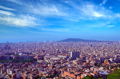 High angle view of illuminated buildings in city against sky