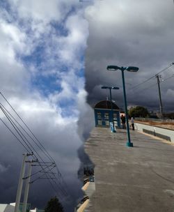 Road against cloudy sky