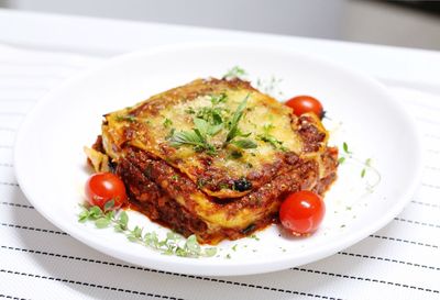 High angle view of lasagna served on table