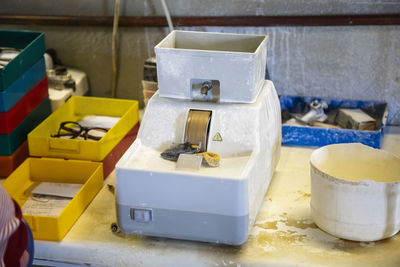 Close-up of machinery on table