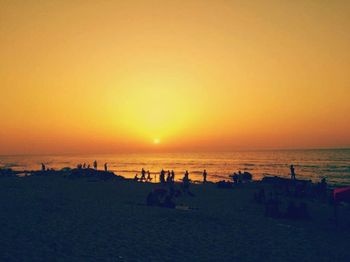 Scenic view of sea at sunset