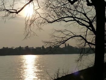 Scenic view of lake at sunset