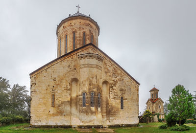 Low angle view of historic building against sky