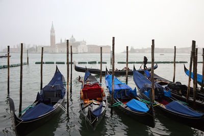 Panoramic view of boats moored in temple against clear sky